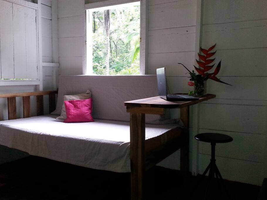 2 twin beds act as sofas during the day - with built in desks