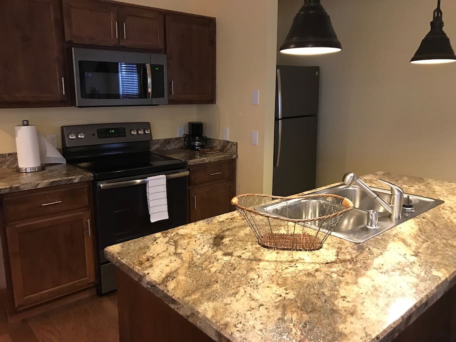 New kitchen in case you want to dine in!