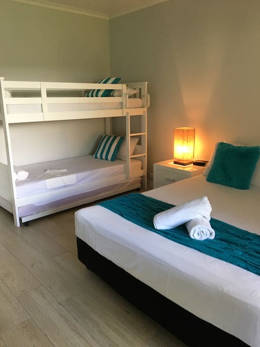 Bunk beds with an extra trundle bed underneath that can be pulled out to make the 4th separate bed. In total you could sleep 5.