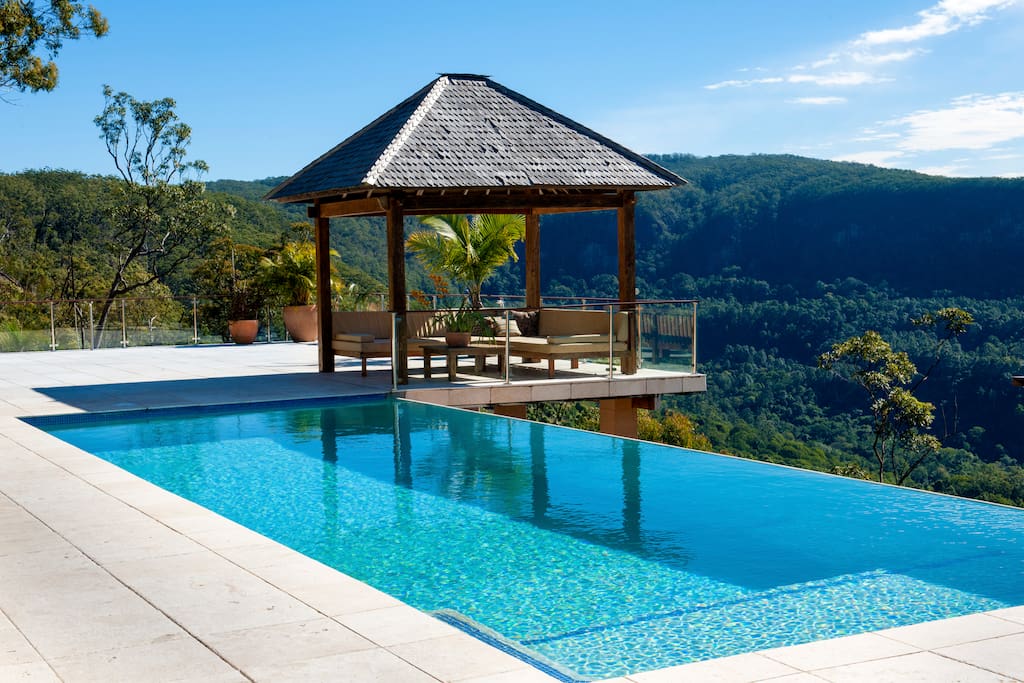 12 x 4 metre infinity pool and large marble decking with comfortable daybeds to lounge around soaking in the views.