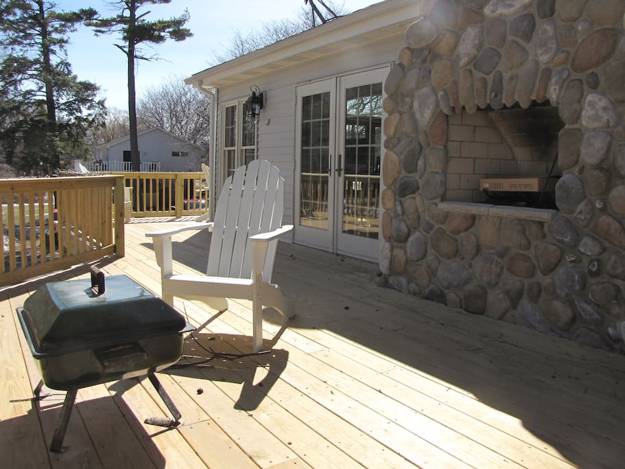 Vast upper level deck space that wraps around Murphy's Den and Conference room. Includes an outside fireplace that overlooks the Wilson Harbor.