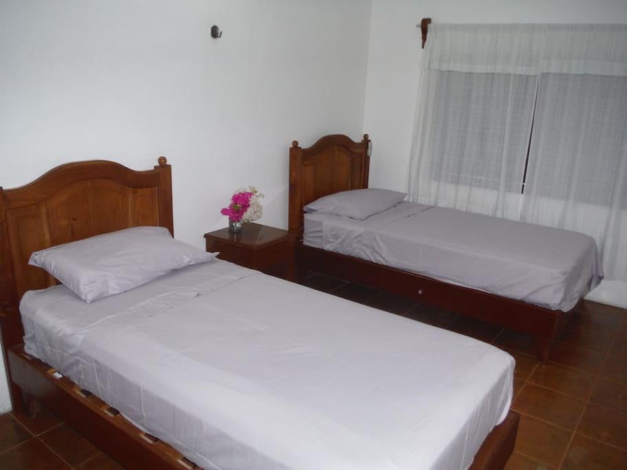 Back Room with 2 Single Beds, can also be placed together as a King Size Bed