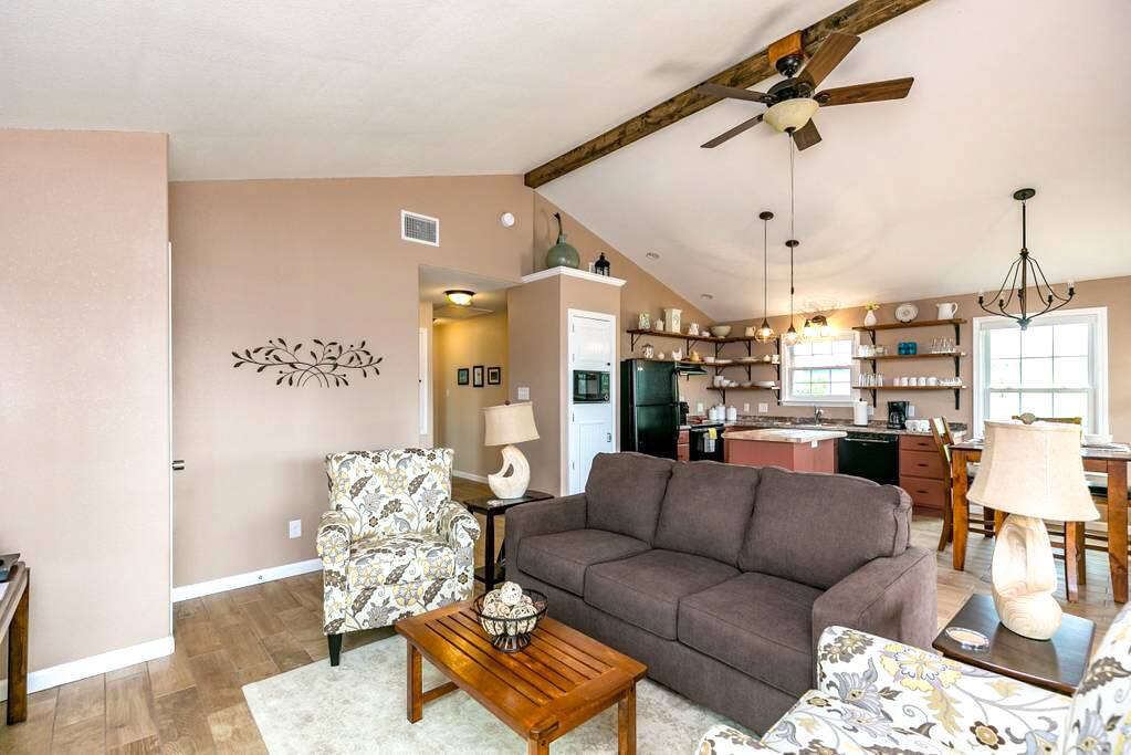 The living room offers 2 armchairs and a sofa which pulls out to a full sleeper.