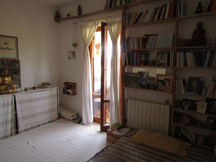 The bedroom with the balcony