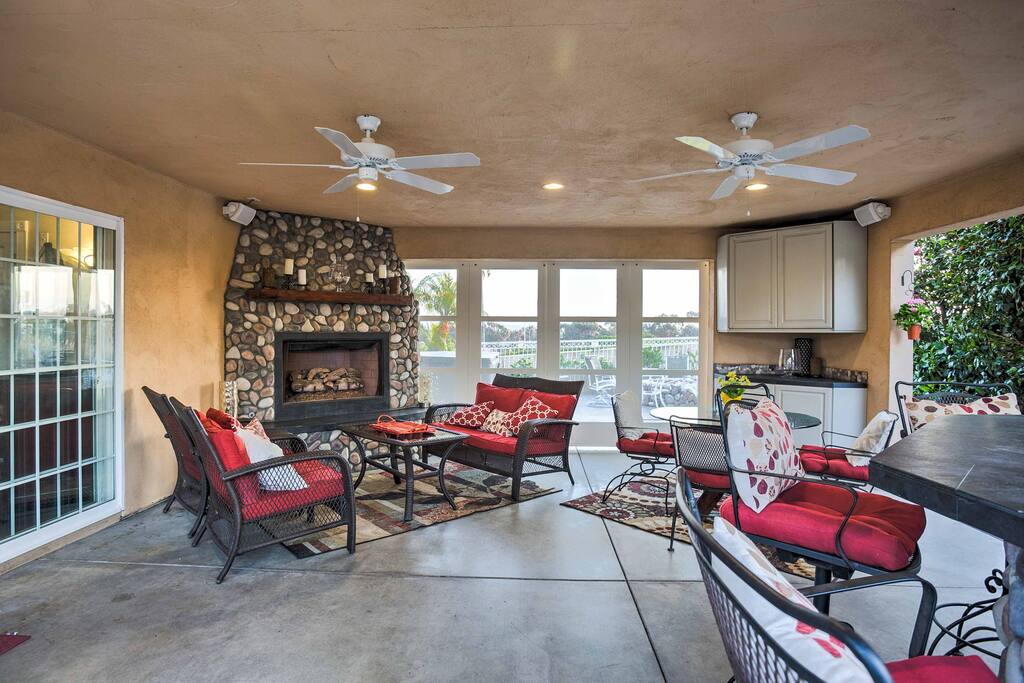 Warm up by the fireplace on the covered patio!