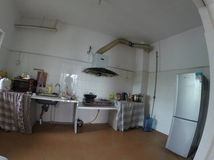 kitchen with oven, stove, refrigerator etc.