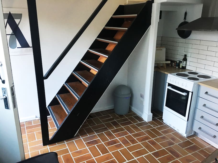 Kitchen and stairs to the bedroom