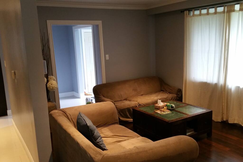 Other side of the family room leading to front entrance.