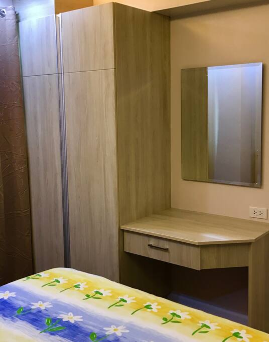 Closet and Dresser of Bedroom