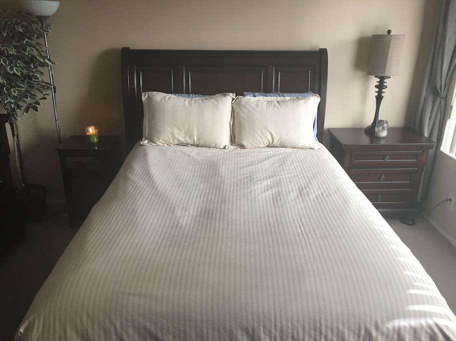 Two nightstands, lamps and drawer space