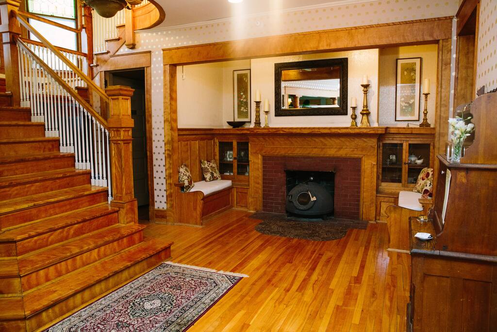 The main entry features original built-ins and amazing woodwork