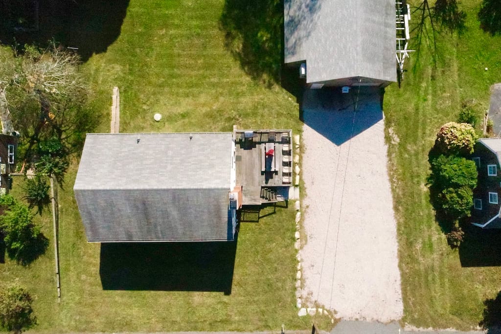 Ariel footage of property. Large driveway.
