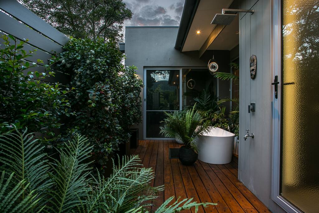 Outdoor shower and bath with hot and cold water