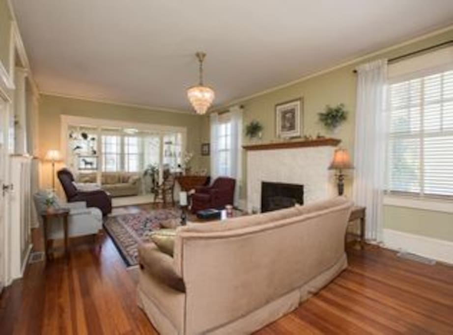 Spacious living area with cable television.