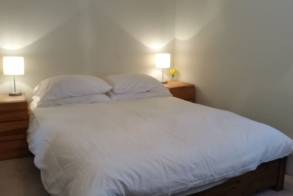 king size bed with Egyptian cotton linen in very quiet bedroom