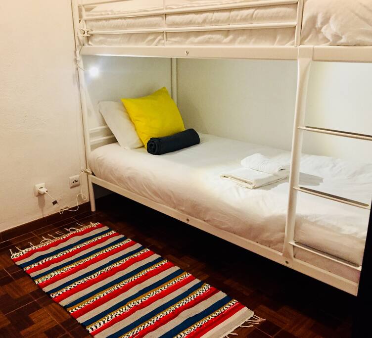 Yellow room with bedside light