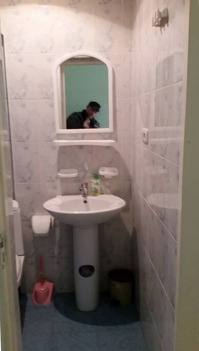 Washer in bathroom.
