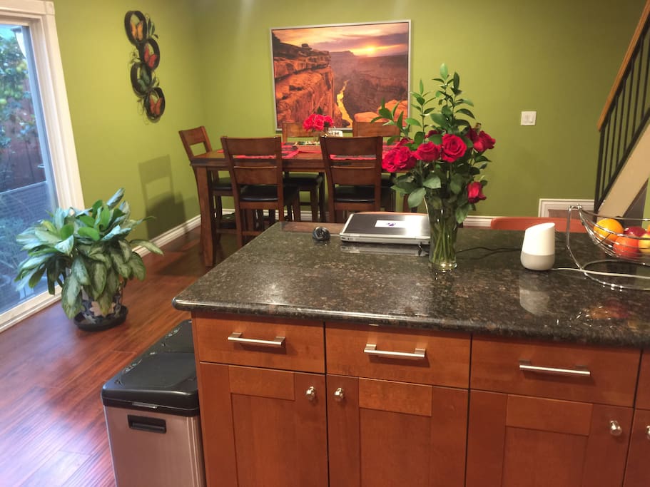Kitchen area with dining table.
