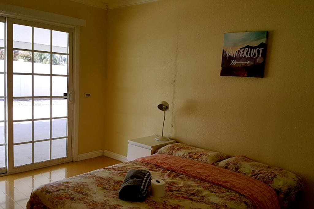 spacious room has a slide door goes to the yard