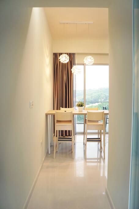 View from entrance to living room (dining table)
