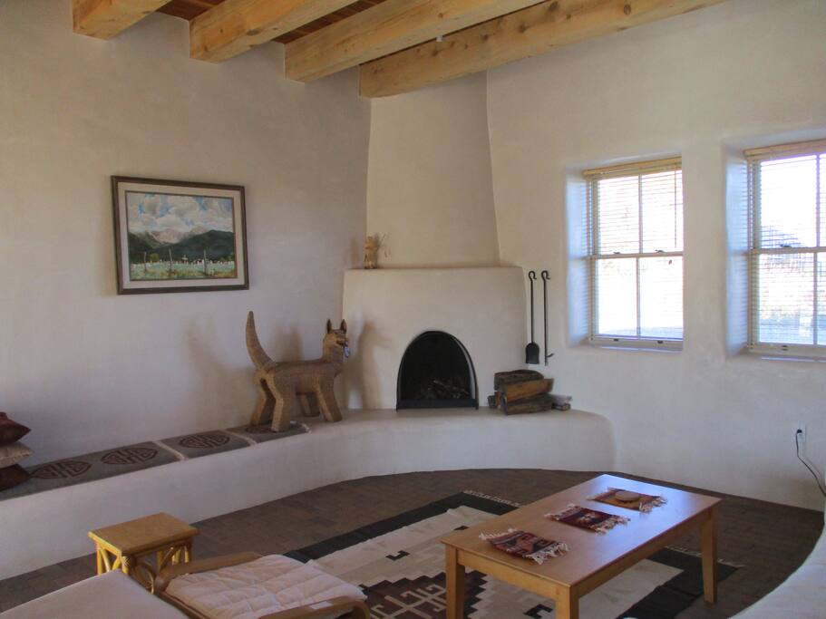 The living-room with fireplace.