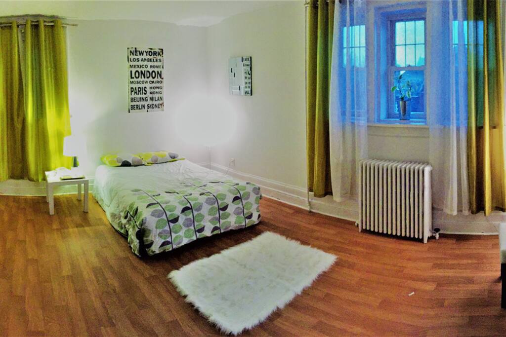 Large master suite. Four windows, large closet, double bed.