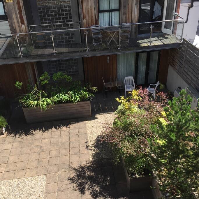 View from the terrace into quiet courtyard.