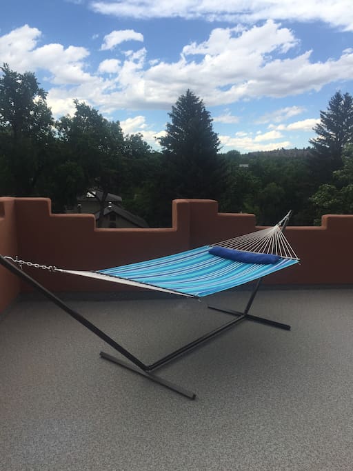 Rest in a hammock on the north facing side of the deck.
