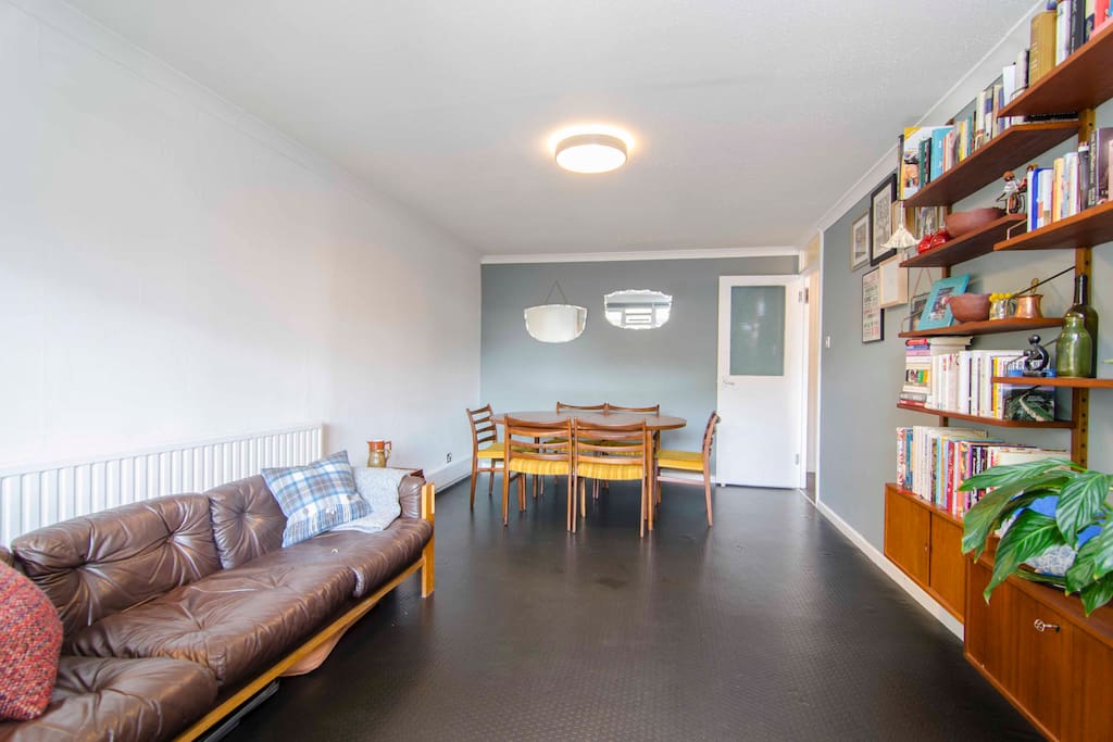 Sizable lounge with lots of natural light and a vintage charm