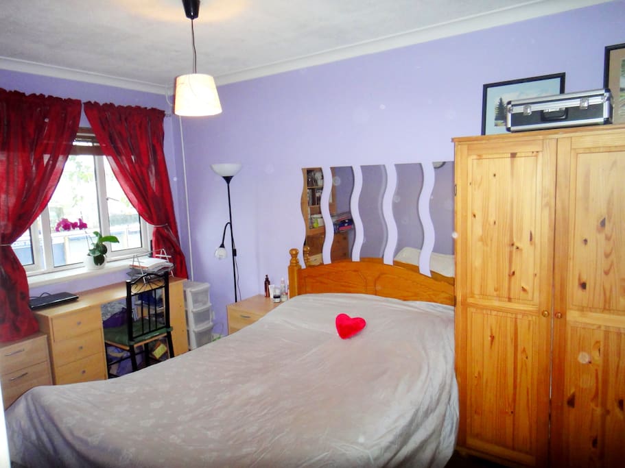 Spacious double bedroom facing quiet plaza
