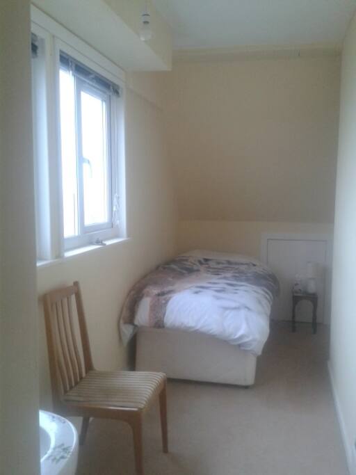 The single room with windows looking out to sea