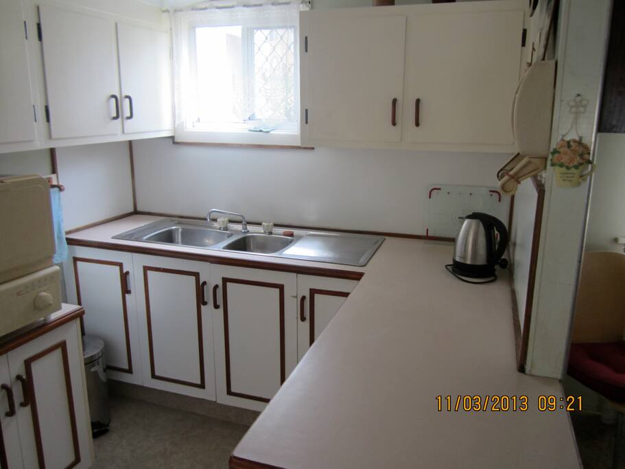The kitchen.It's small and compact with everything you need (we hope)