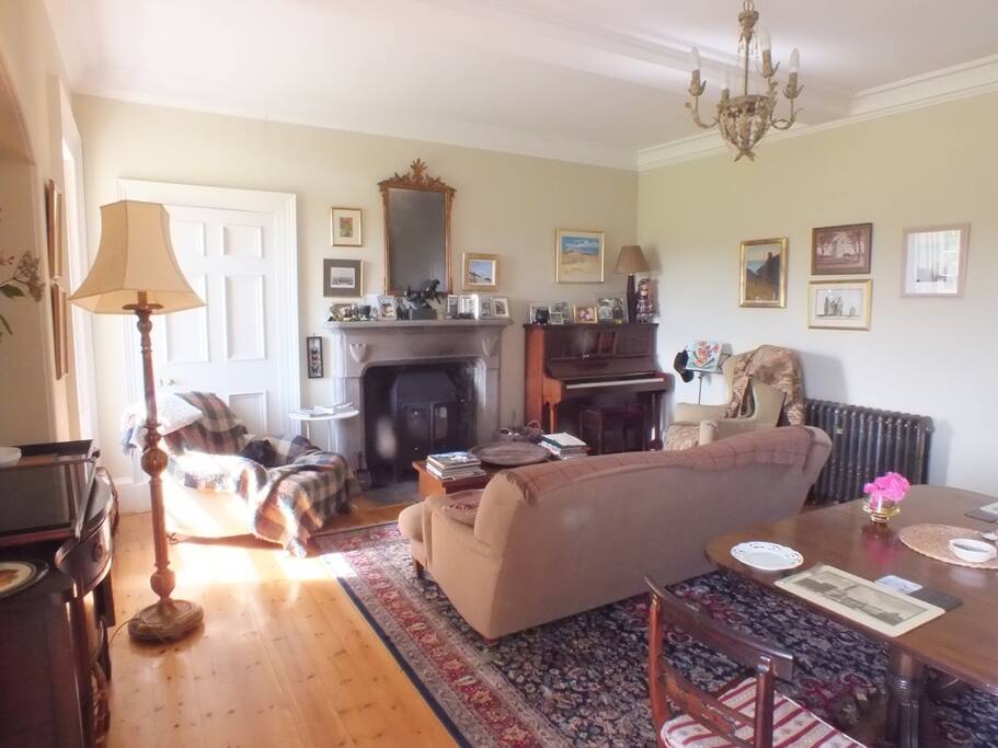 The drawing room and dining room.