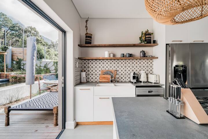 Solar-Powered Mountain Retreat with Natural Pool gallery image 5