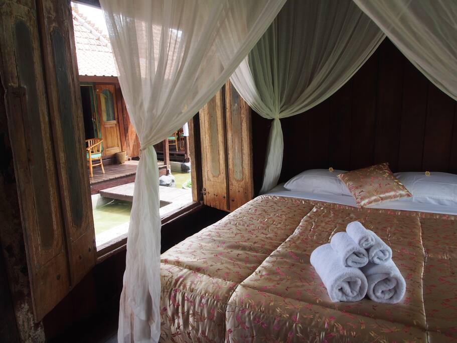 Separate traditional Joglo style villa with antique doors and windows