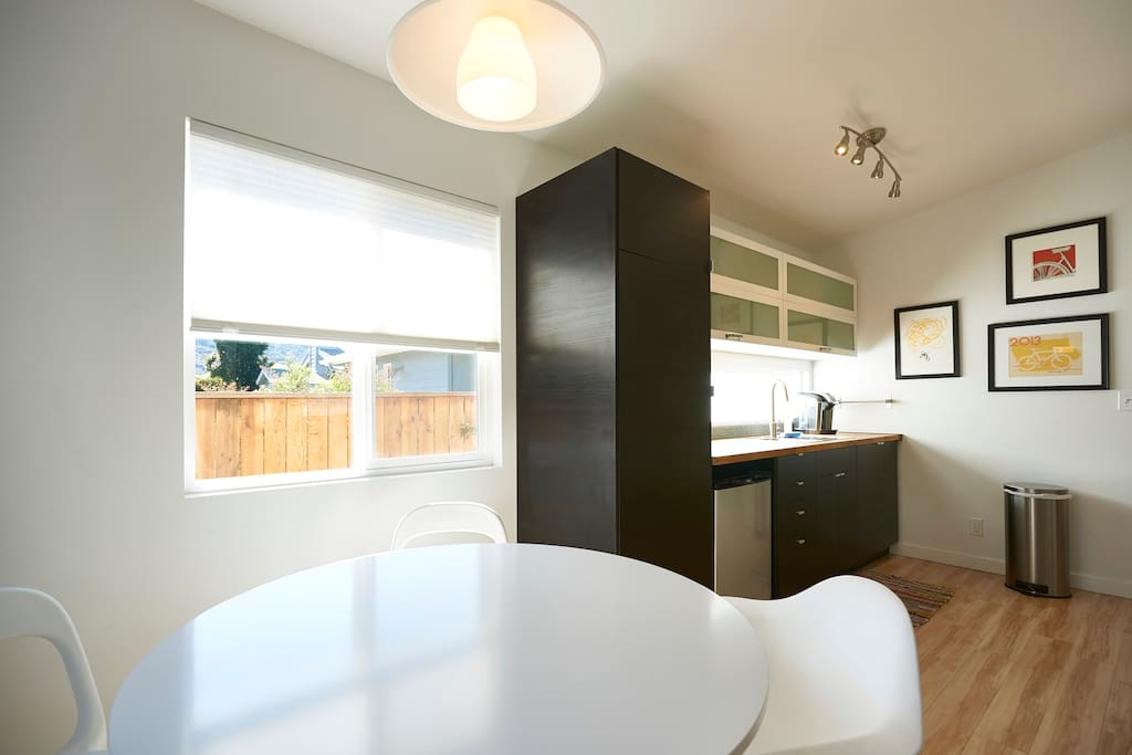 Kitchenette with microwave, toaster oven, single cooktop, multiple coffee making options and more.