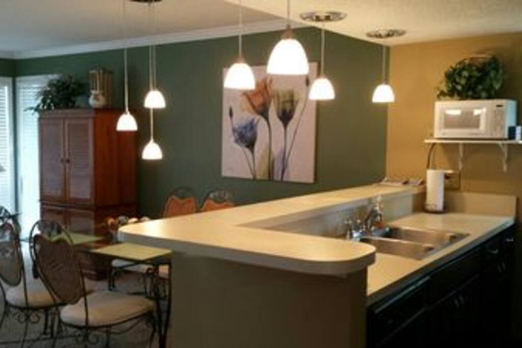 Kitchen Area and Dining Room From Entrance