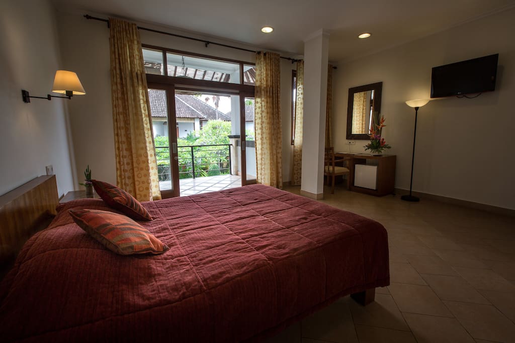 Spacious and bright room offers queen size bed