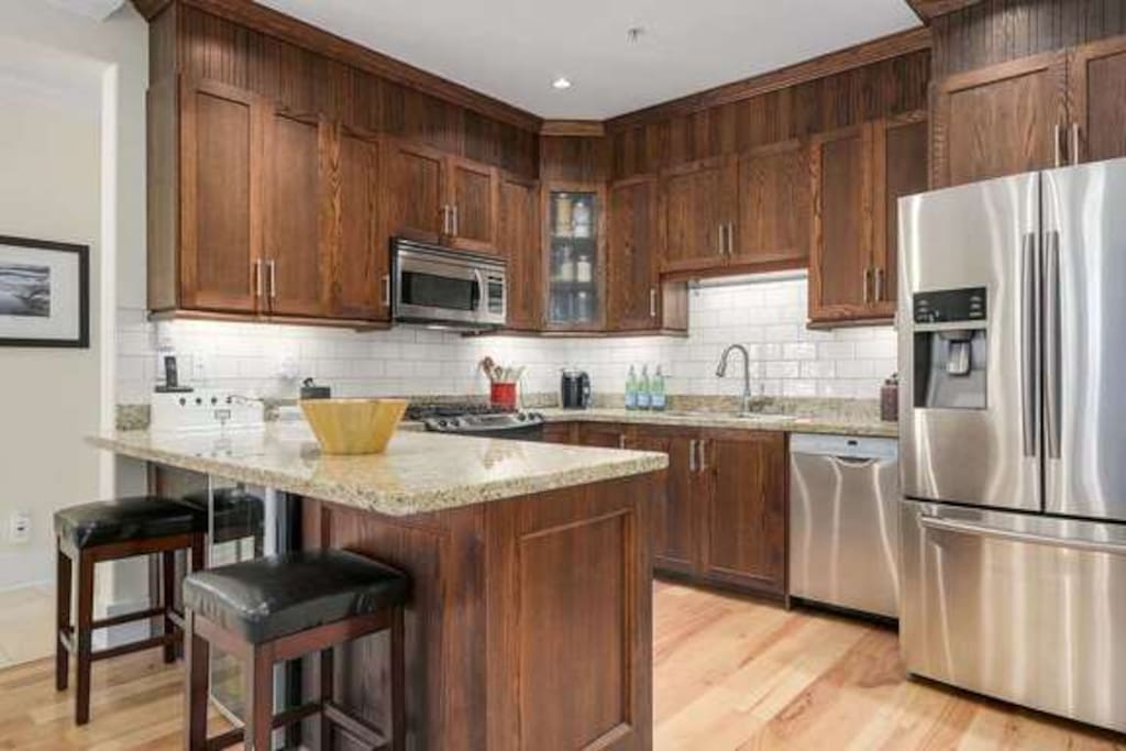 Large open concept shared kitchen and dining room