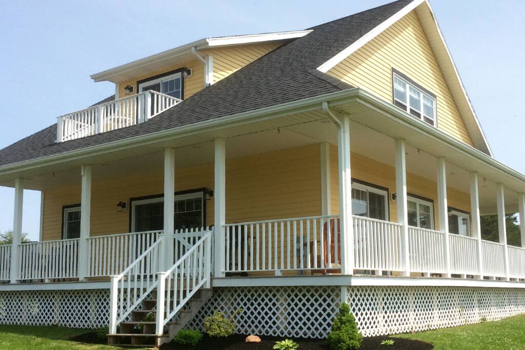 Beautiful wrap around patio with BBQ, patio seating and rocking chairs to sit back and enjoy your stay! Fire pit also available in yard.