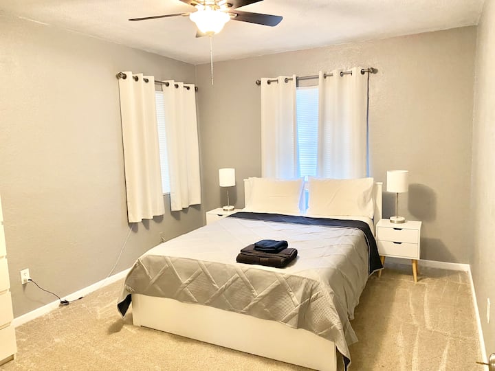Bedroom 1 :
Queen size bed
Firm 12 inch memory foam mattress 
2Nightstands 
2Night lamp 
Fan
Dresser 
Mirror 
Closest 
Hangers 
Iron/table 
Blackout curtains 