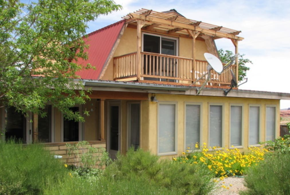 South side of house, showing deck on guest suite