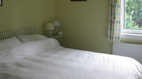 Self-contained sunny family apartment with parking