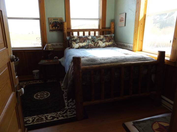 Horse BEDROOM with queen bed, with desk and gas stove