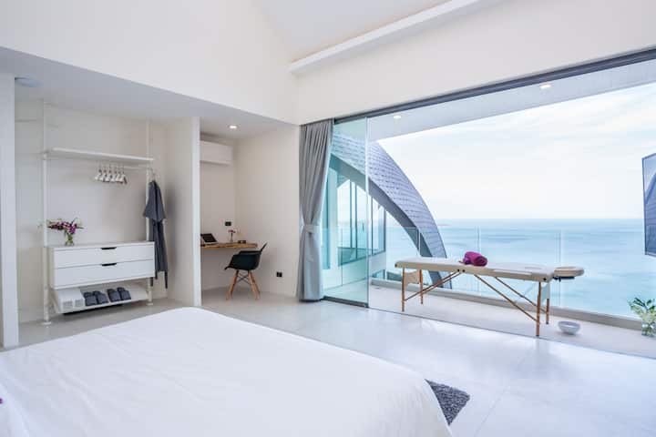 明亮的卧室，可欣赏梦幻景观