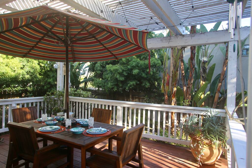 The grounds at Grand Beach Bungalow include mature Bird of Paradise, giant Palms, fragrant Plumeria, lush Jade, and many other species.