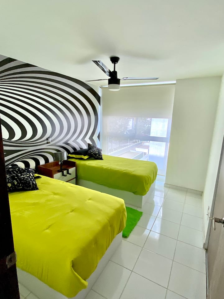 Zweites Schlafzimmer mit Einzelbetten