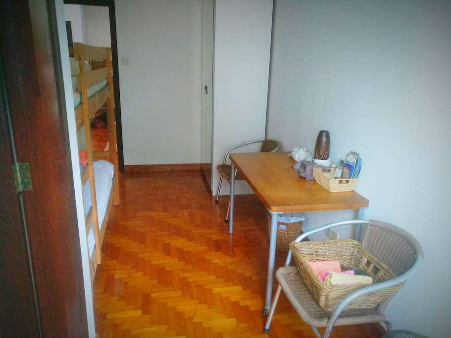 Large Wardrobe at the far corner with large mirrors on the doors.