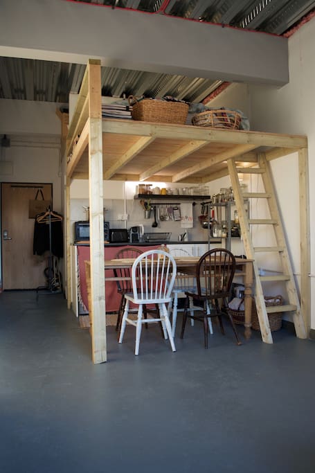 Kitchen and mezzanine bed.