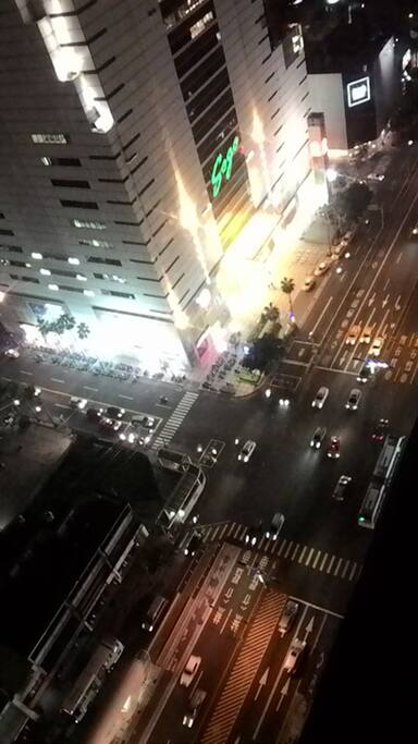 looking out at the city below from window